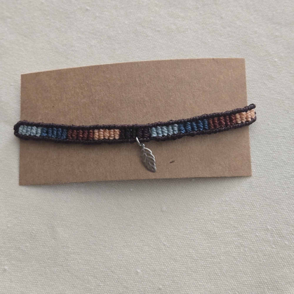 002 New Handmade Woven Bracelet with Leaf Charm